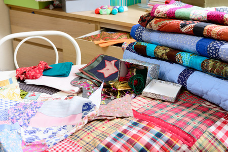 workshop of a seamstress with fabric and patchwork