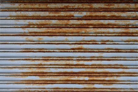 Abstract background with rusty sheet metalの写真素材