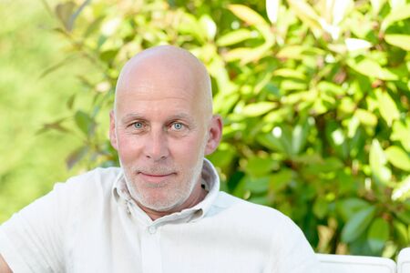 portrait of a middle-aged man outdoorの写真素材