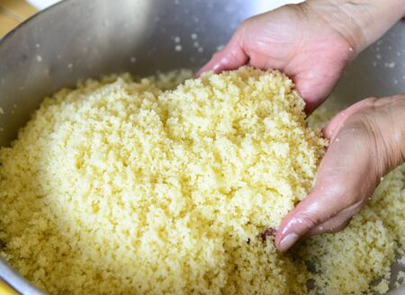 preparation of couscous with semolinaの写真素材
