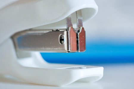 white stapler closeupの写真素材