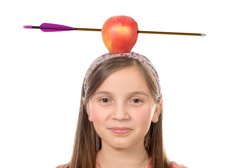 a girl with apple on his head with arrow shot throughの写真素材