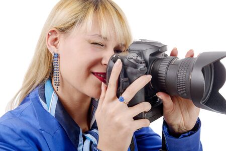 a young woman with a camera on isolated on white background.