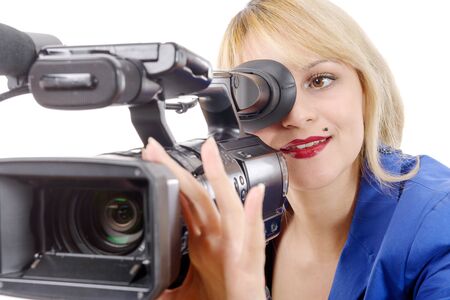 a beautiful young woman with blue suit and professional video camera