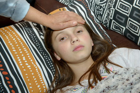 young pre teen girl with headacheの写真素材