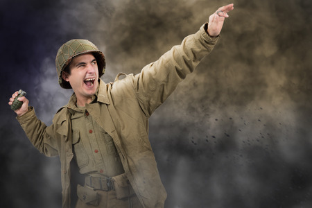  young American soldier ww2 throwing a grenadeの写真素材