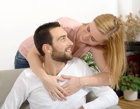 a portrait of happy young couple