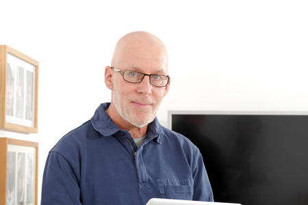 Portrait of a senior man with glassesの写真素材