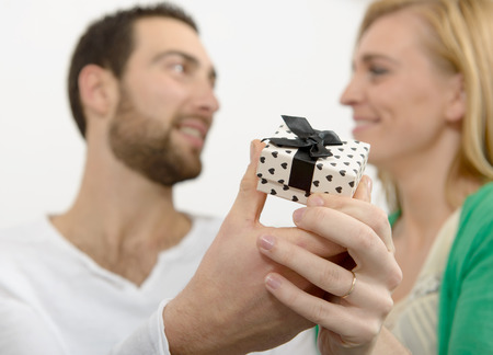 a young couple of lovers with a jewel