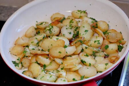 the grilled potatoes slices in the dishの写真素材