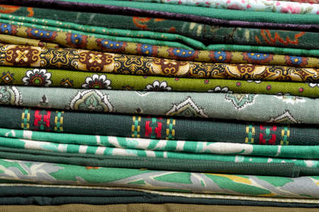 a stack of multicolored fabricsの写真素材