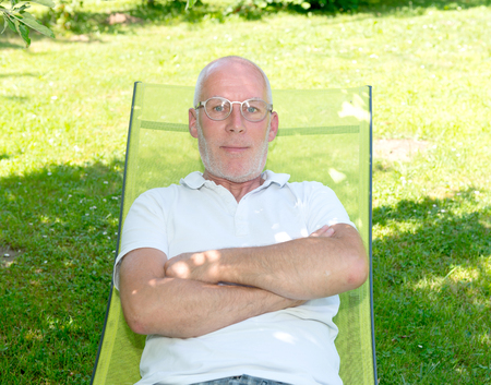 Portrait of a mature man with arms crossedの写真素材