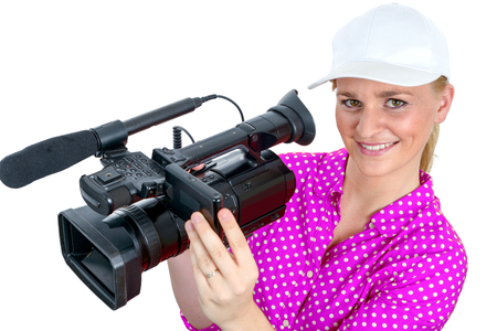 a blond young woman with professional video camcorder, on white