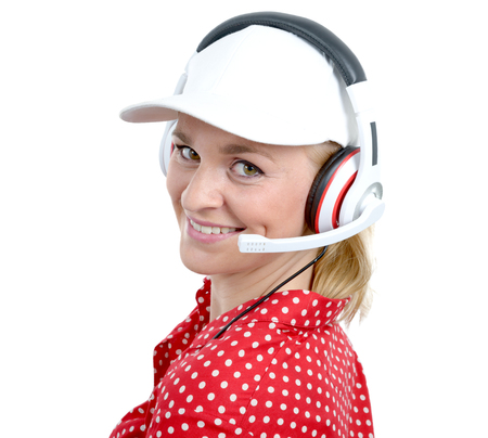 blond young woman with headset and white cap, on whiteの写真素材
