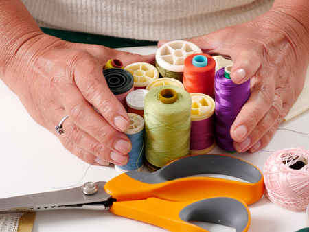 a close-up of the hands of a seamstress