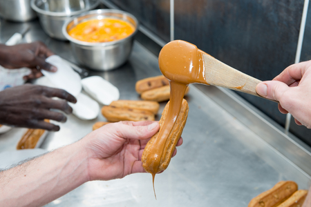 the pastry chef prepares pastries, close upの写真素材