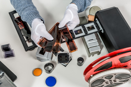 a technician scan a negative film and slidesの写真素材