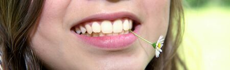 a close-up of a teenager's smileの写真素材