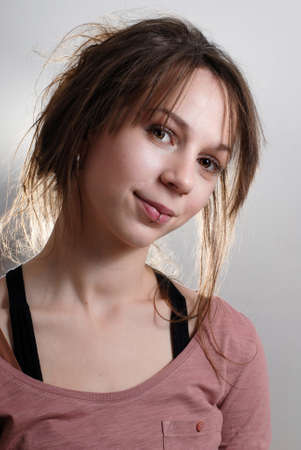 a portrait of a young woman with long hairs