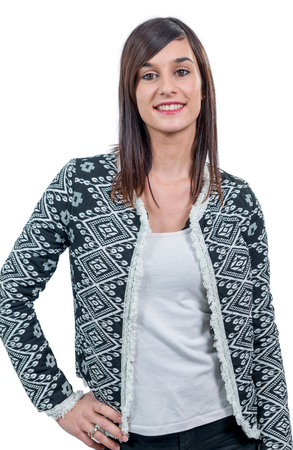 a portrait of a young brunette woman dressed with a black jacketの写真素材