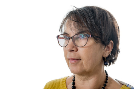 a portrait of brunette mature woman with eyeglasses