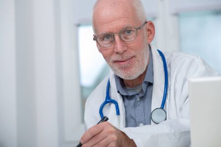 portrait of medical doctor with a  stethoscopeの写真素材