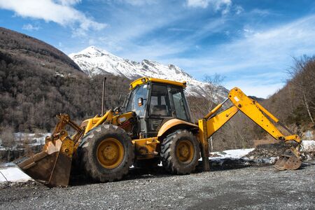 yellow earth mover in the mountain