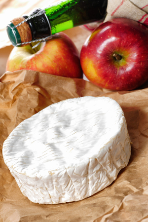 camembert of Normandie with red appleの写真素材