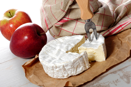 camembert of Normandie with red appleの写真素材