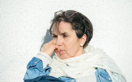 portrait of a middle-aged woman in the spring sunの写真素材