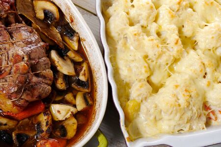 roast pork and a cauliflower gratinの写真素材