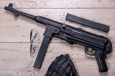 air soft gun with protective glasses and a lot of bulletsの写真素材