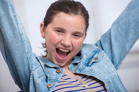 a very happy young teenager girlの写真素材