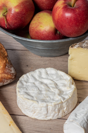 a normandie camembert cheese with applesの写真素材