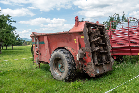 a machine for spreading manure in the fieldsの写真素材