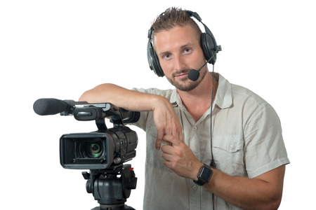 man with professional camcorder isolated on the white background