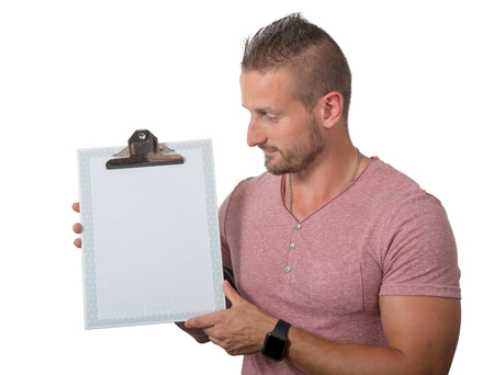 a young man showing a clipboard on whiteの写真素材