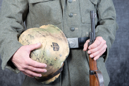 belt and helmet of the German soldier in a jacket the second world war