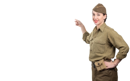 young woman dressed in american ww2 military uniform showing empty blank signboard with copy space