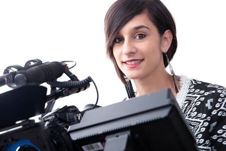 young woman with professional video camera, DSLR, isolated on white background