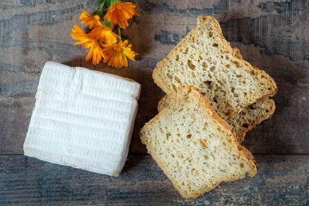 a Pont Eveque french normandy cheese with bread