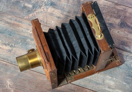 a wood photographic folding on the wooden backgroundの写真素材