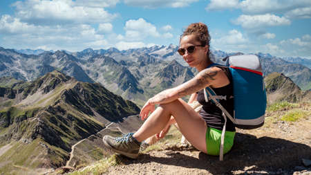 young woman and Pic du Midi de Bigorreの写真素材