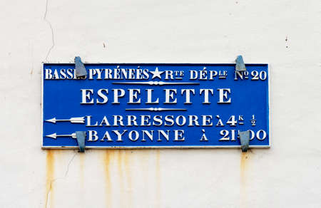 an old sign of the small town of Espeletteの写真素材