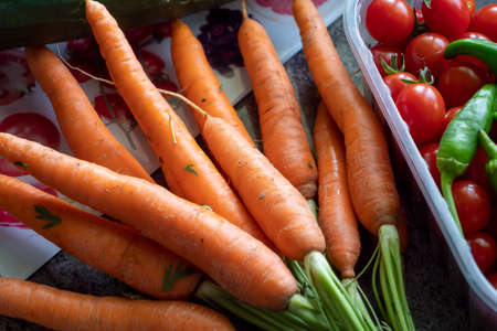 delicious organic carrots on a tableの写真素材