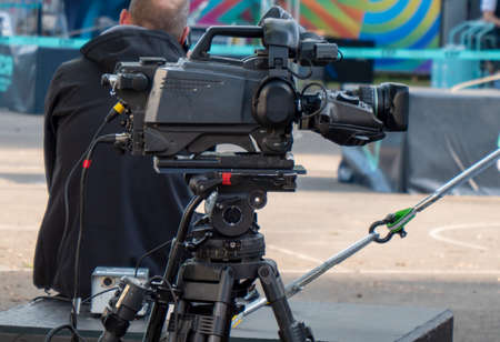 a professional video camera on a tripod
