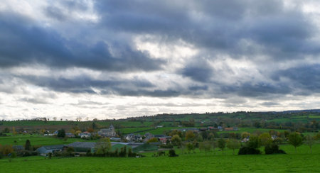 a landscape of normandy countryside, cloudy skyの写真素材