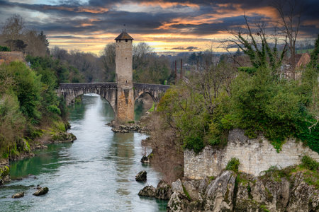 View of Pont Vieux, bridge in Orthez, New Aquitaine, Pyrenees Atlantiques department, Franceの写真素材