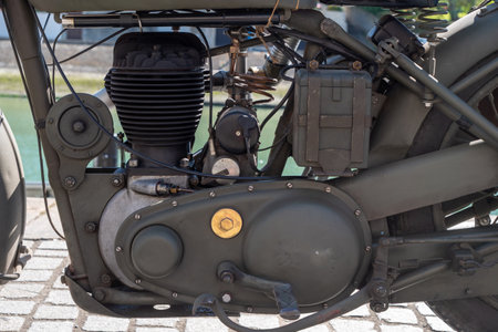 A motorcycle engine is old and has a military appearanceの写真素材