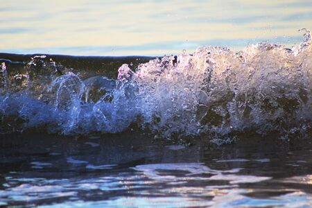 Small ocean wave, crashing